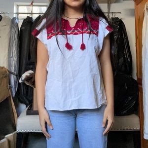 ethnic embroidered top with tassels